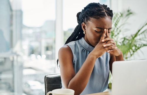 Stress Young Female Black Worker MED Istock Delmaine Donson