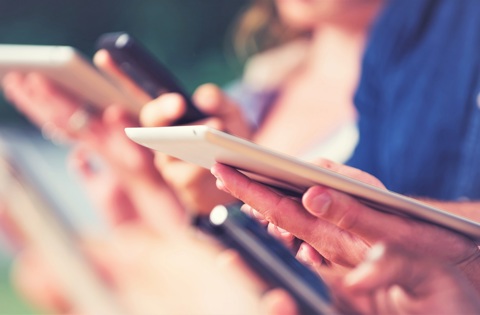 Person reviewing information on a tablet device