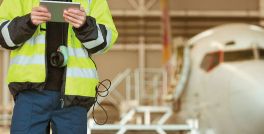 Health and safety employee in high vis jacket