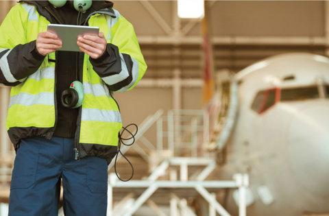 Health and safety employee in high vis jacket