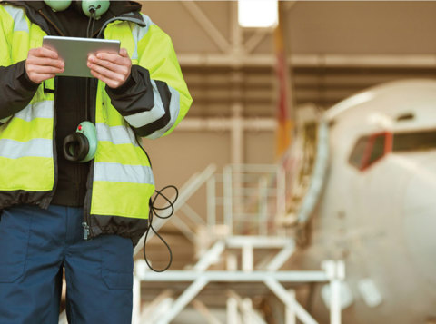Health and safety employee in high vis jacket