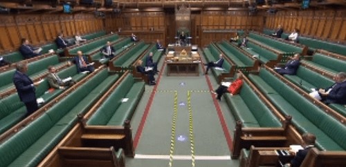 With the number of MPs allowed physically into the chamber limited to 50, the usual shouting and cheering is gone