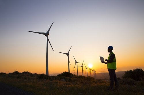 Lone Worker Wind Turbines iStock BulentBaris