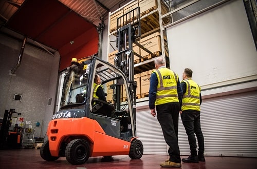 Two men and forklift