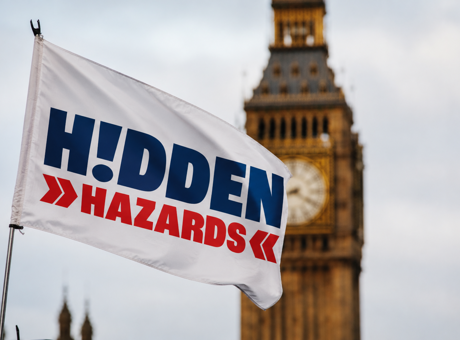 Hidden Hazards campaign flag outside the Houses of Parliament in London