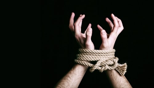 Modern Slavery Hands Tied iStock/NadyaPhoto