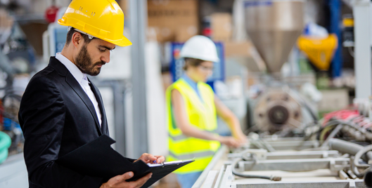 Manager working in hard hat