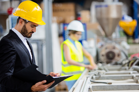 Manager working in hard hat