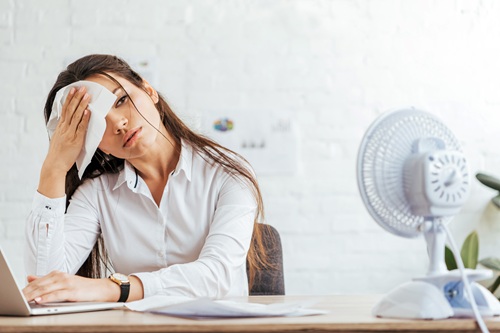 Hot Office Worker MED Istock Credit Lightfieldstudios