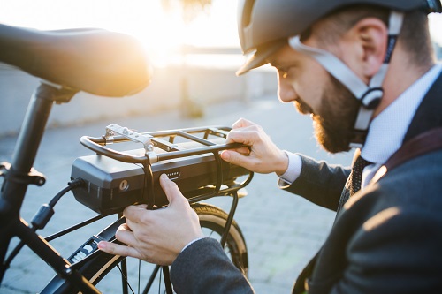 Commuter Setting Up Electric Bicycle MED Istock 1135090330 Halfpoint